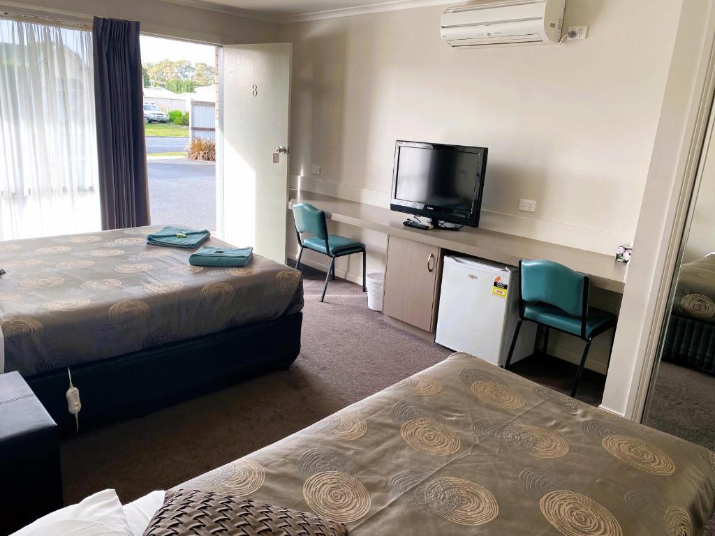 Postel nebo postele na pokoji v ubytování Dalvue Motel
