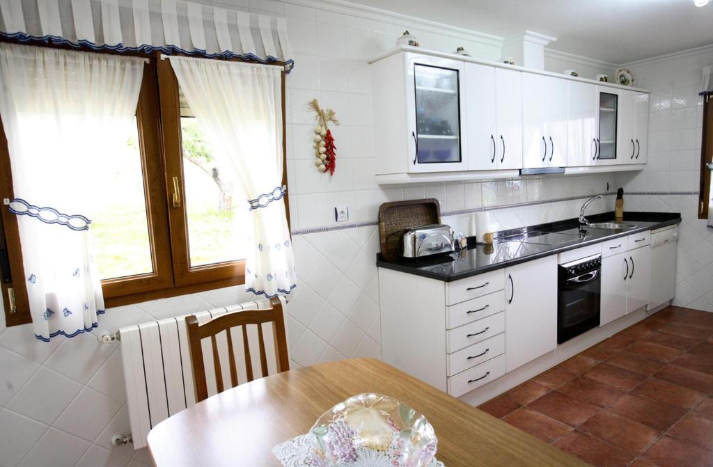 Kuchyň nebo kuchyňský kout v ubytování Vivienda Vacacional Supereda