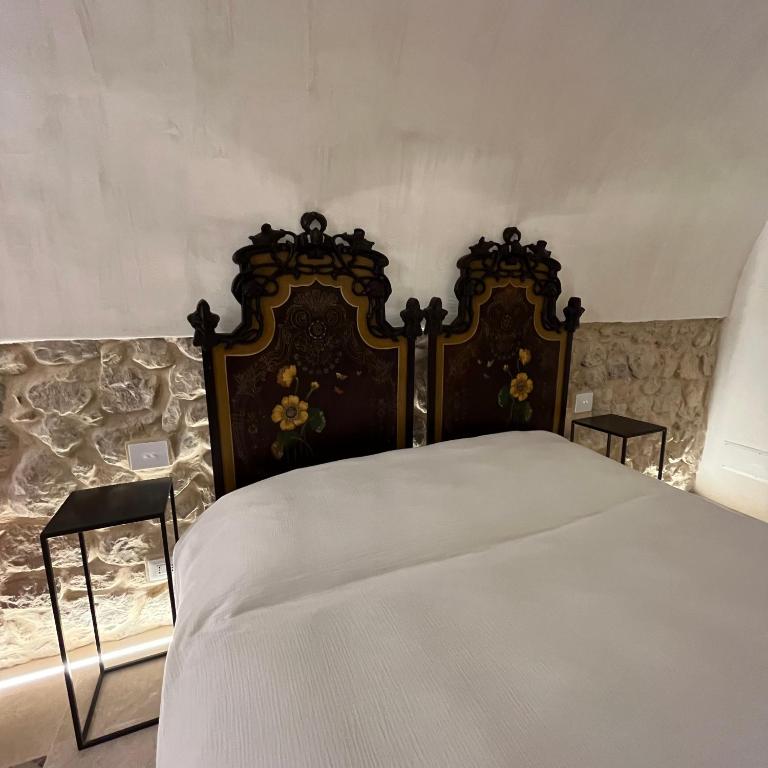 Postel nebo postele na pokoji v ubytování B&B Scicli La Casuzza