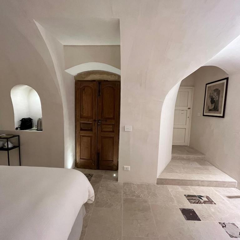 Postel nebo postele na pokoji v ubytování B&B Scicli La Casuzza
