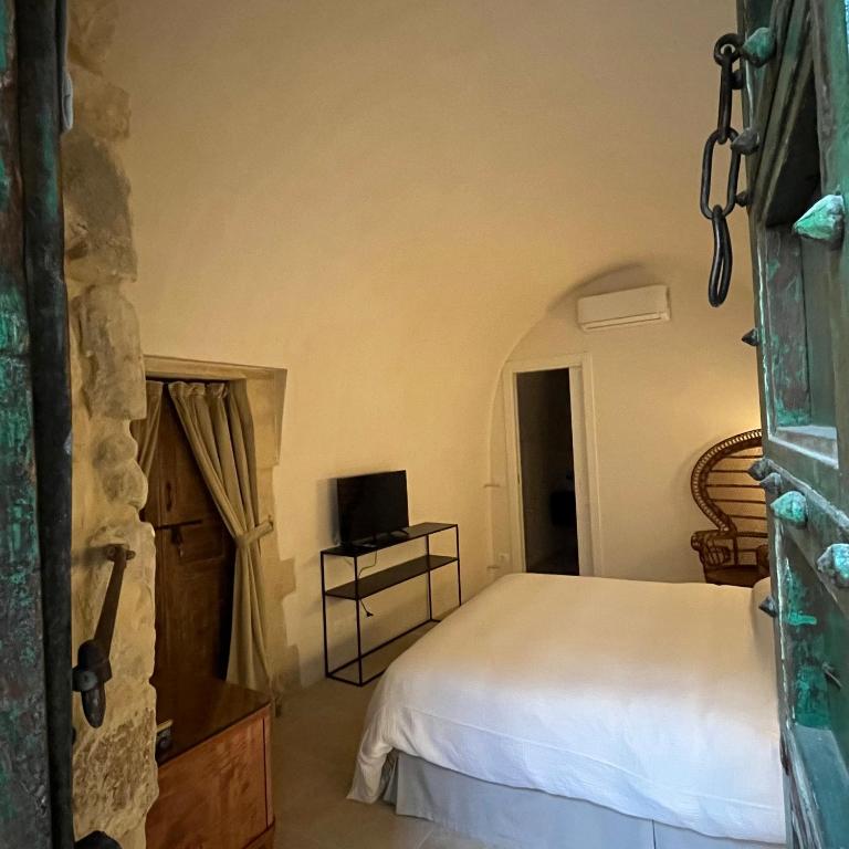 Postel nebo postele na pokoji v ubytování B&B Scicli La Casuzza