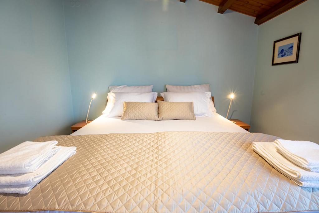 Postel nebo postele na pokoji v ubytování Adriatic Bay Apartments