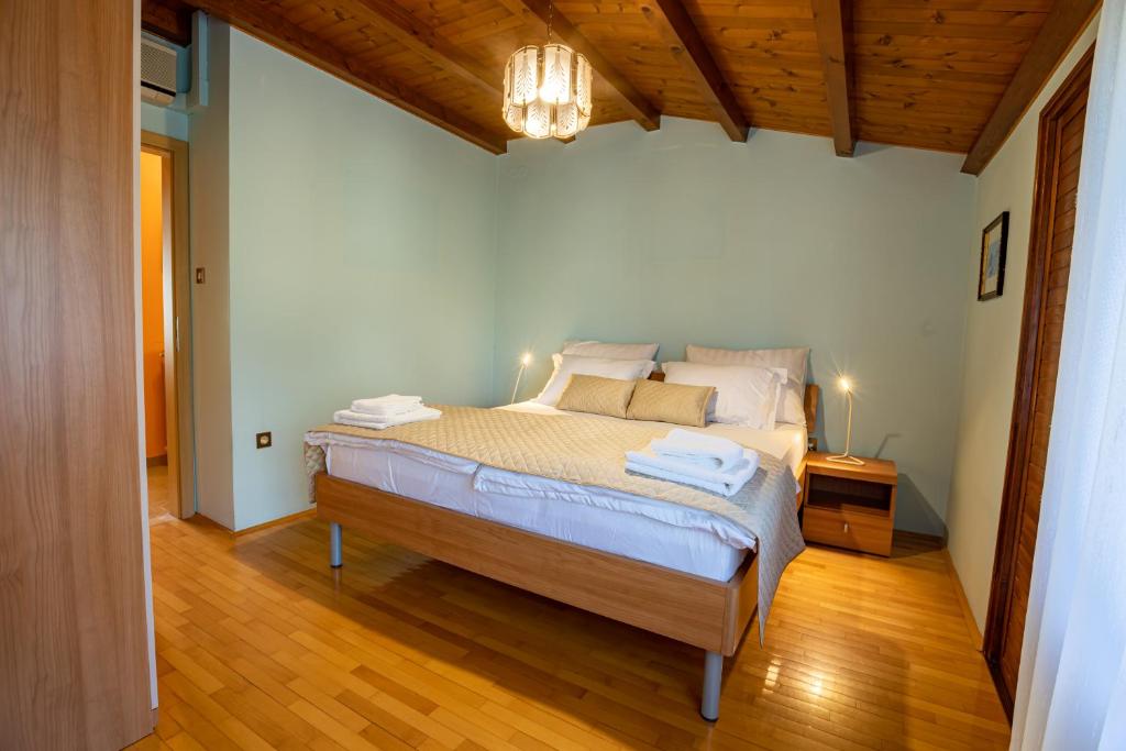 Postel nebo postele na pokoji v ubytování Adriatic Bay Apartments