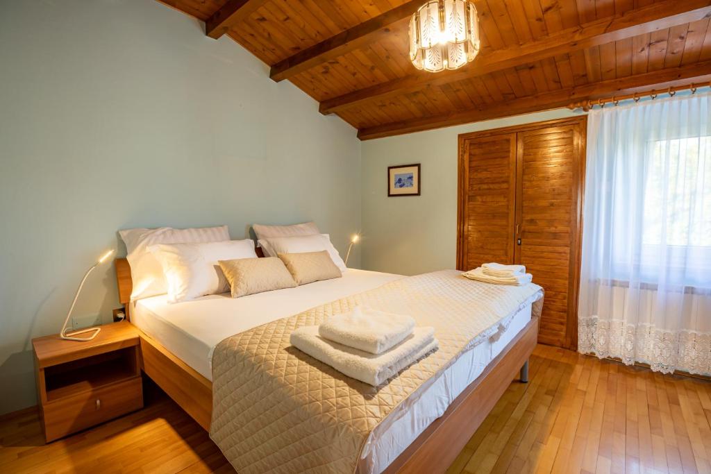 Postel nebo postele na pokoji v ubytování Adriatic Bay Apartments