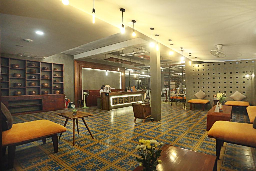 Posezení v ubytování Central Corner Suite