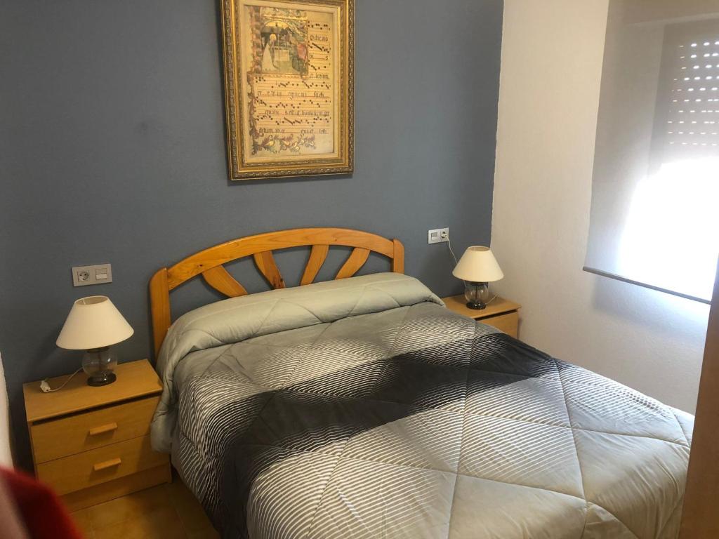 Postel nebo postele na pokoji v ubytování Apartamento Oropesa del Mar en primera linea de playa
