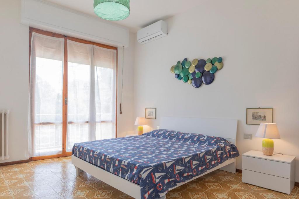Posteľ alebo postele v izbe v ubytovaní Casetta sul Mare - HelloElba