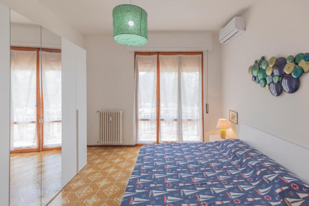 Posteľ alebo postele v izbe v ubytovaní Casetta sul Mare - HelloElba