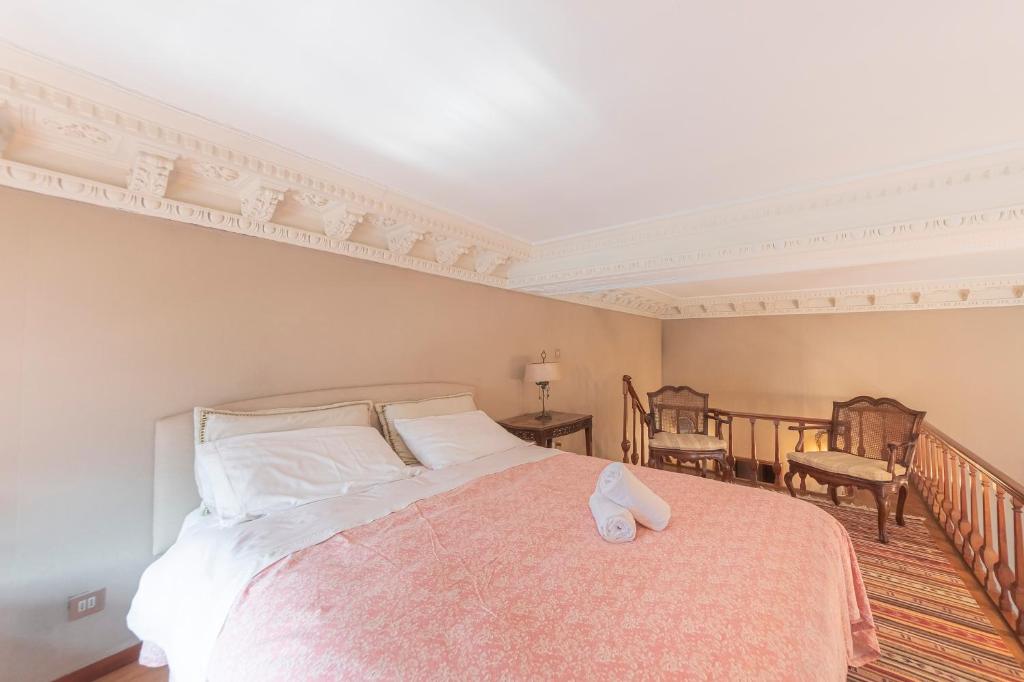 Posteľ alebo postele v izbe v ubytovaní Canal Grande Suite