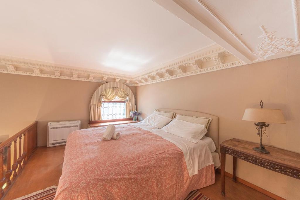 Posteľ alebo postele v izbe v ubytovaní Canal Grande Suite
