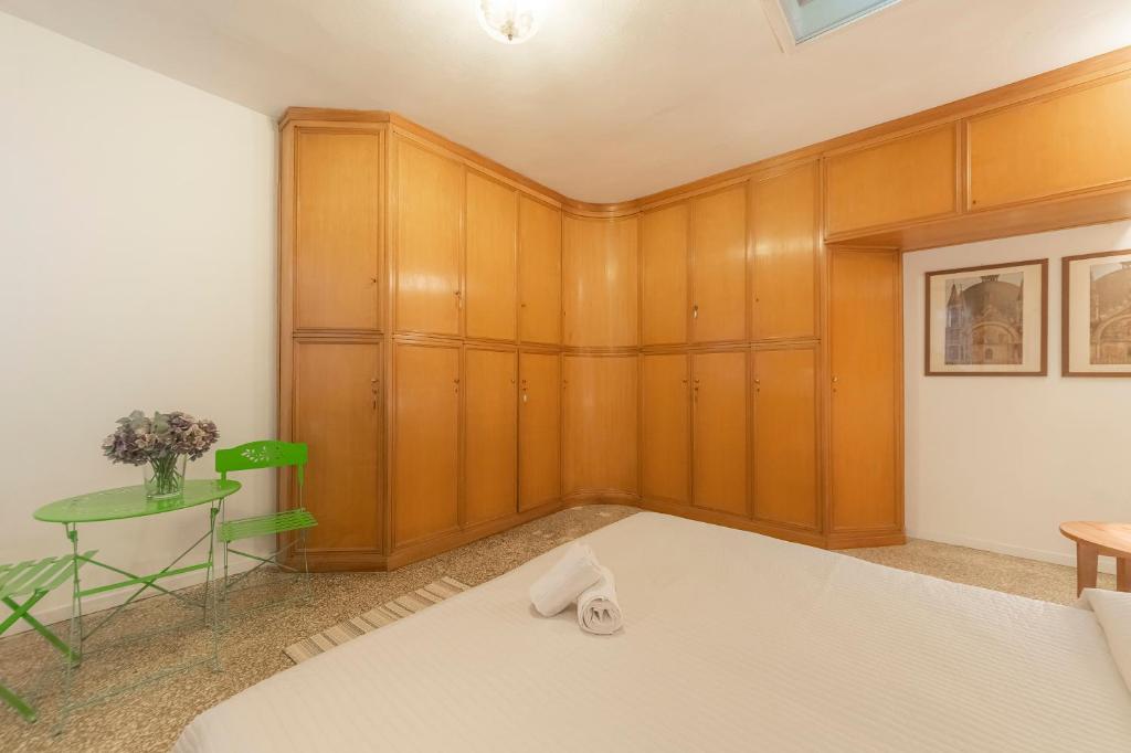 Posteľ alebo postele v izbe v ubytovaní Canal Grande Suite