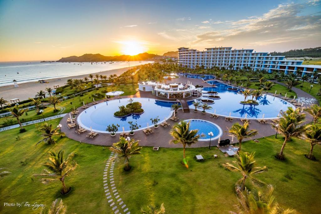 an aerial view of a resort and the beach at FLC Luxury Hotel Quy Nhon in Quy Nhon