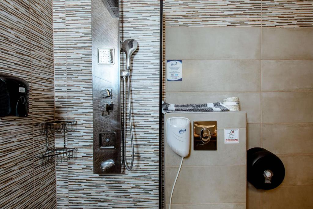 Koupelna v ubytování Deluxe Suites
