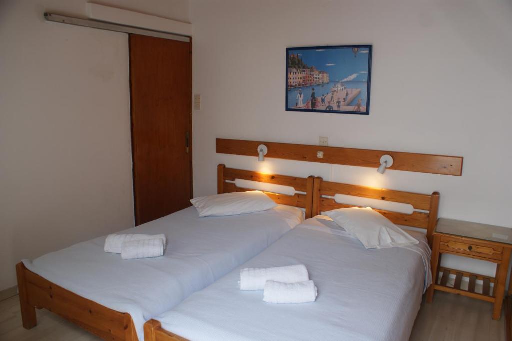 Postel nebo postele na pokoji v ubytování Hotel Eleftheria