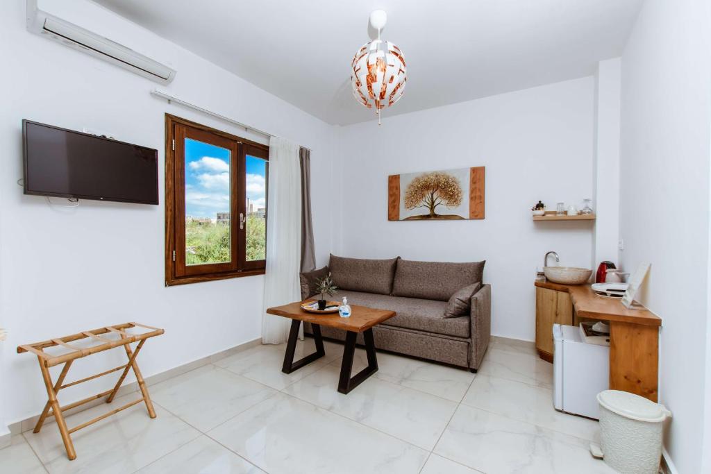 TV a/nebo společenská místnost v ubytování Deluxe Suites