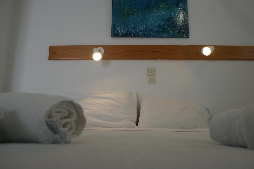 Postel nebo postele na pokoji v ubytování Hotel Eleftheria