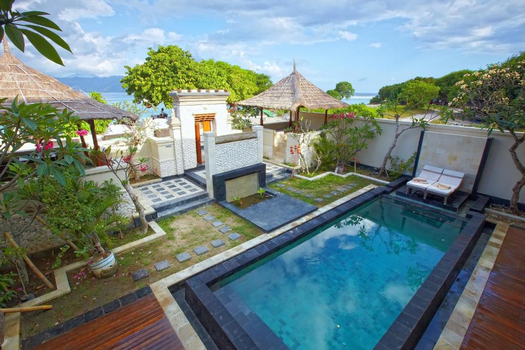 een afbeelding van een zwembad in een villa bij Kokomo Resort in Gili Trawangan