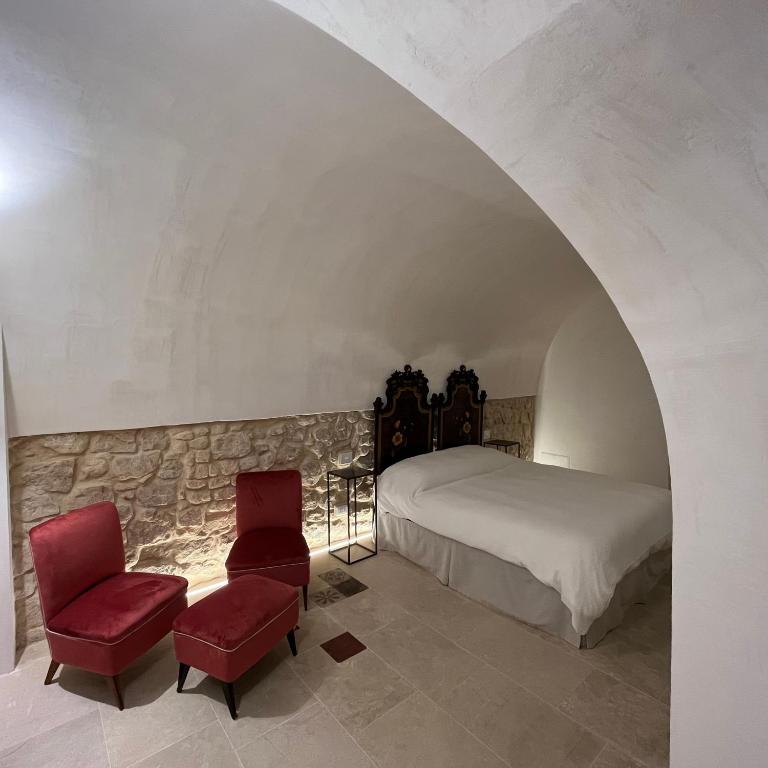Postel nebo postele na pokoji v ubytování B&B Scicli La Casuzza