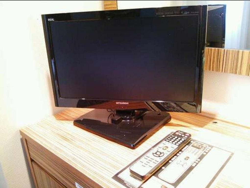 チサンホテル郡山にあるテレビまたはエンターテインメントセンター
