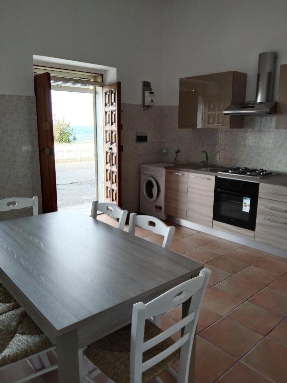 Kuchyňa alebo kuchynka v ubytovaní Casa di Sole