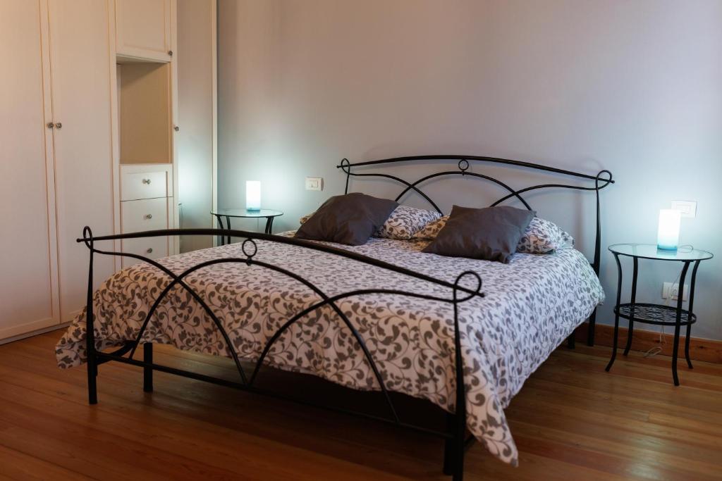 Postel nebo postele na pokoji v ubytování Manfredi B&B