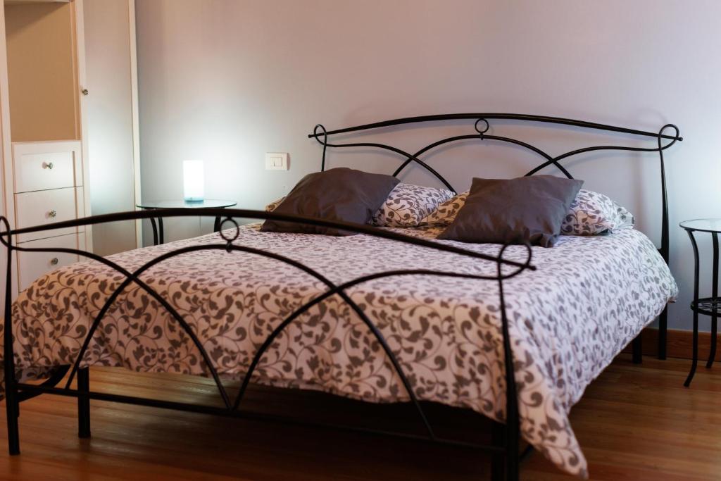 Postel nebo postele na pokoji v ubytování Manfredi B&B