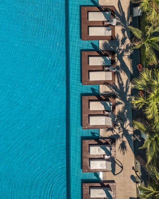 an overhead view of a building next to a pool at Nestor Hotel in Ayia Napa