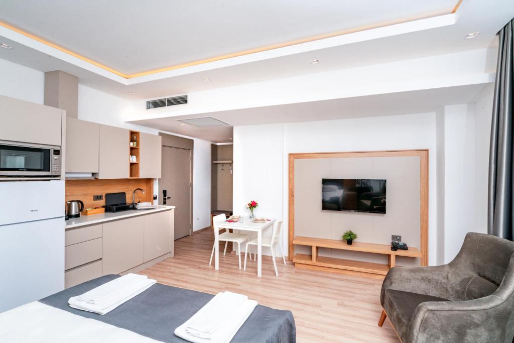 Kuchyň nebo kuchyňský kout v ubytování New Safir Apart Hotel
