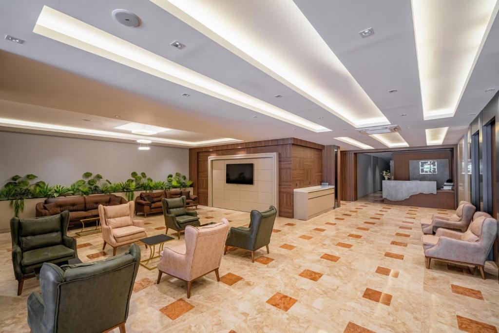 TV a/nebo společenská místnost v ubytování New Safir Apart Hotel