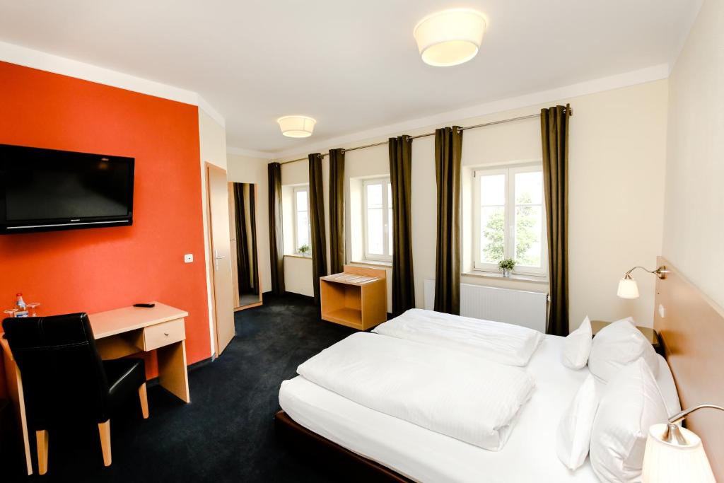 Postel nebo postele na pokoji v ubytování Das Hotel by Ferber