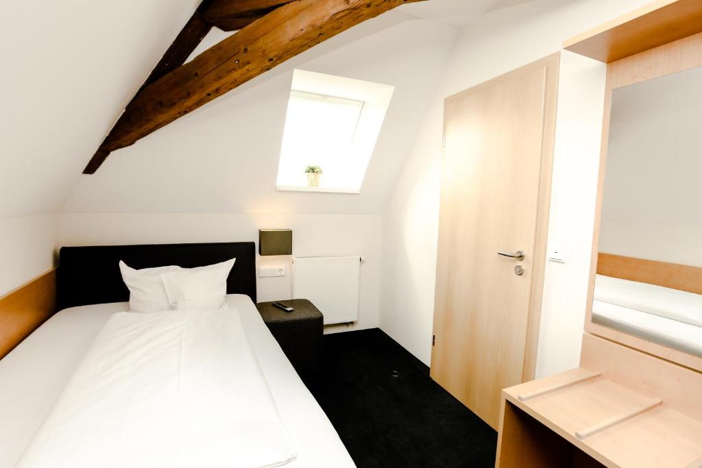 Postel nebo postele na pokoji v ubytování Das Hotel by Ferber