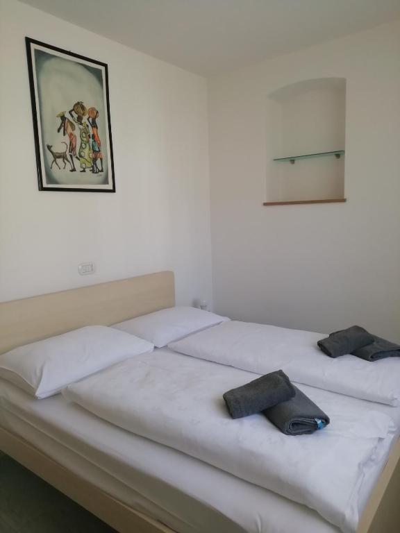 Postel nebo postele na pokoji v ubytování Apartment Residence Veronika