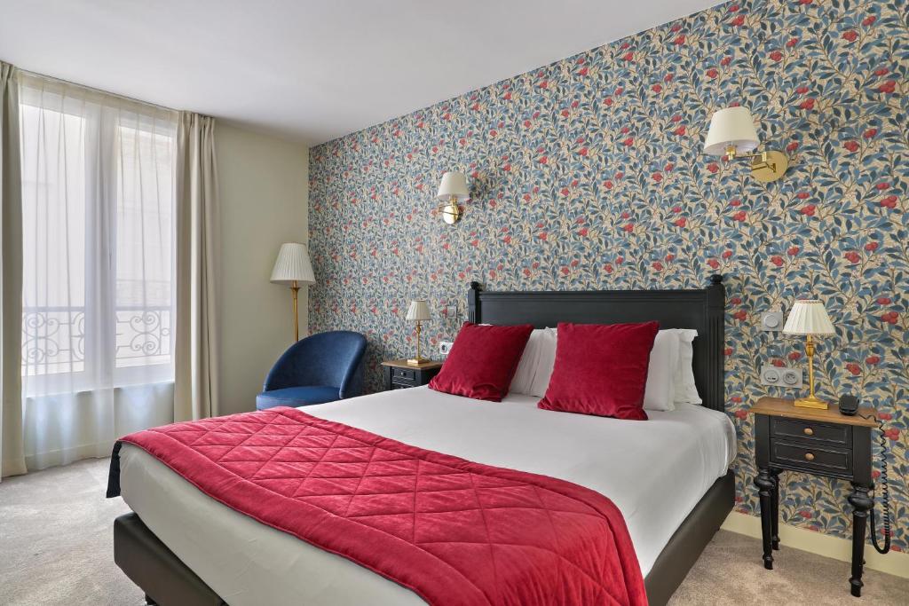Ένα ή περισσότερα κρεβάτια σε δωμάτιο στο Hôtel de Sèvres