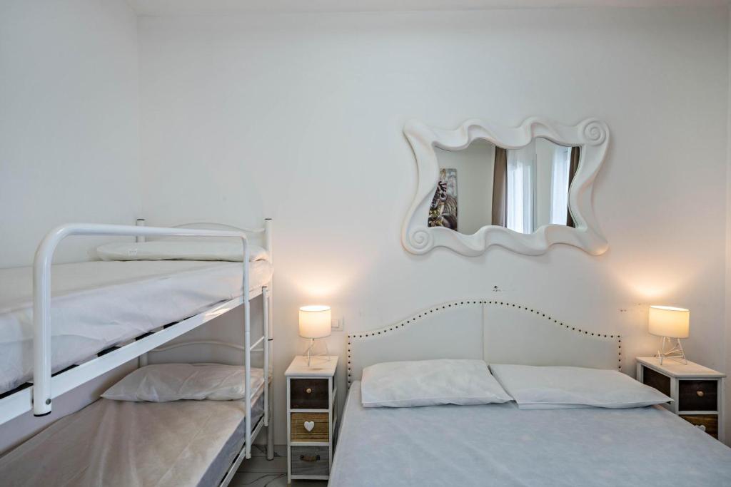 Łóżko lub łóżka w pokoju w obiekcie Planet Suite 303