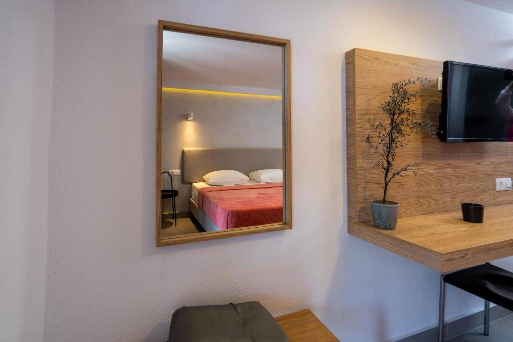 Postel nebo postele na pokoji v ubytování Comfort Zefyros