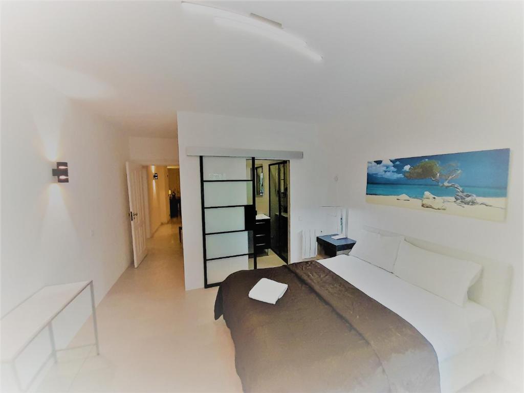 Postel nebo postele na pokoji v ubytování Luxury Apartment near Cascais Town & Marina