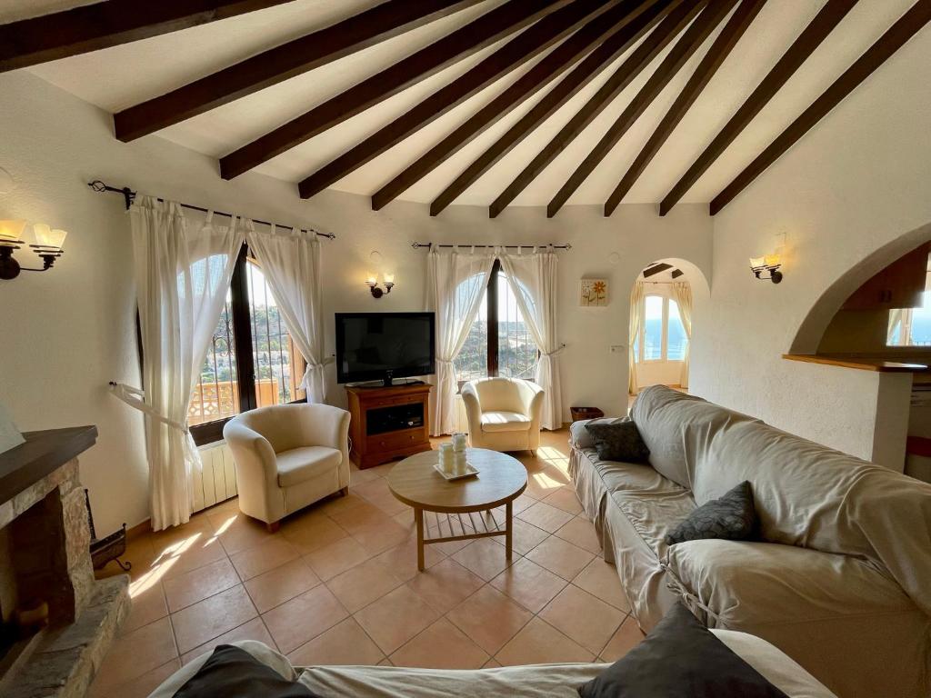 A television and/or entertainment centre at Villa María - Salco la Cumbre
