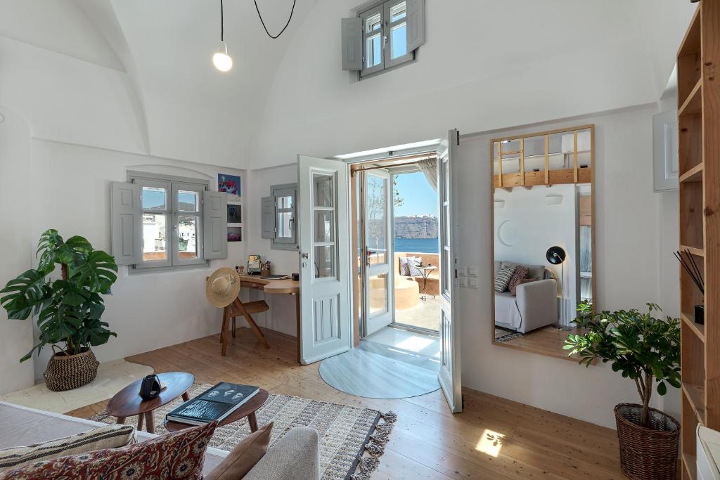 Гостиная зона в Villa Oasis Oia with Caldera View