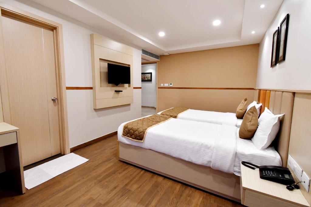 Postel nebo postele na pokoji v ubytování Soho Boutique Hotel