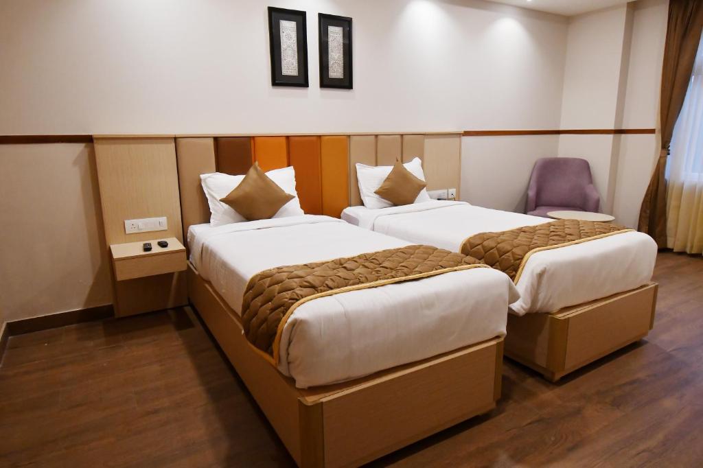 Postel nebo postele na pokoji v ubytování Soho Boutique Hotel