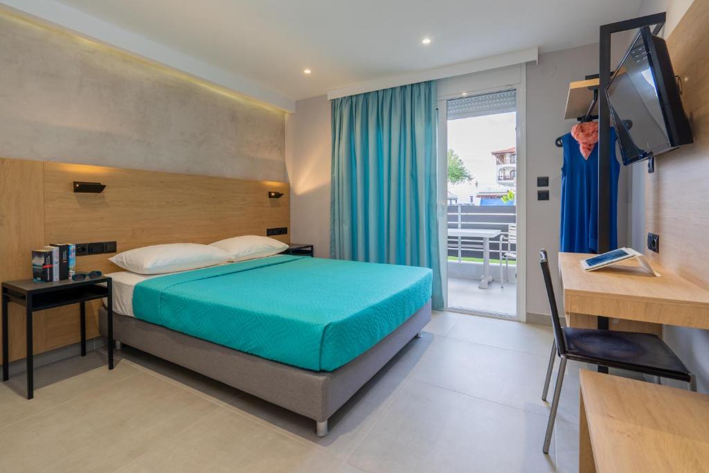 Postel nebo postele na pokoji v ubytování Comfort Zefyros