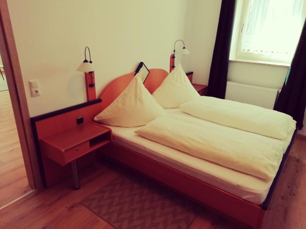 Postel nebo postele na pokoji v ubytování Büchelsteiner Hof
