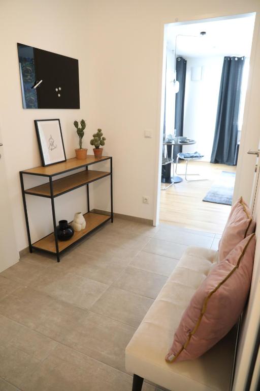 Televízia a/alebo spoločenská miestnosť v ubytovaní City-Apartment Die kleine Mü