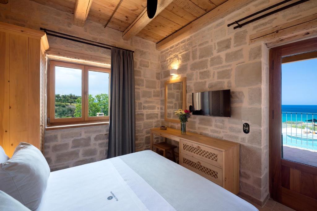 Postel nebo postele na pokoji v ubytování Villa Rodanthi