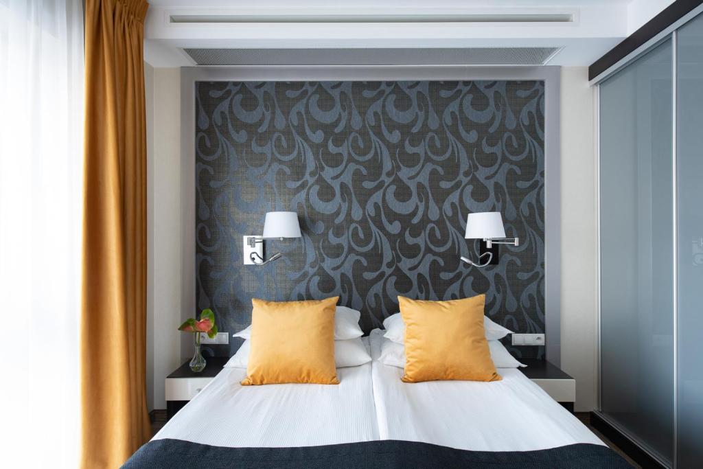 Postel nebo postele na pokoji v ubytování Hotel Arkon Park Gdańsk- Destigo Hotels