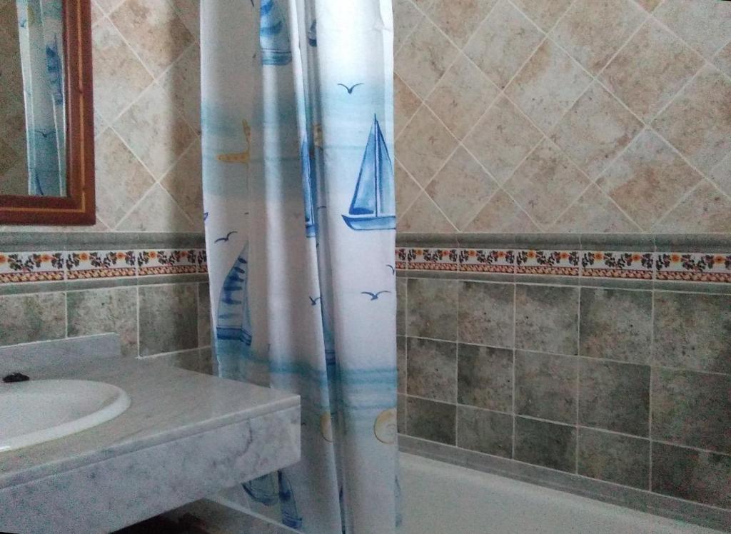 Koupelna v ubytování Villa Raima
