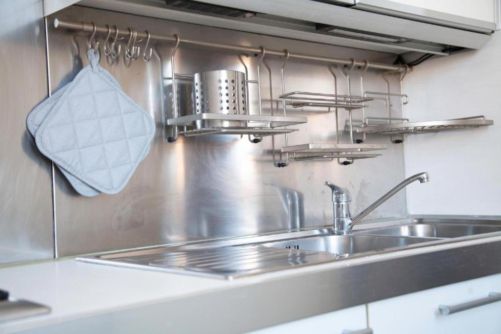 Kuchyňa alebo kuchynka v ubytovaní Navona Design Apartment Casa e Appartamento per Vacanze