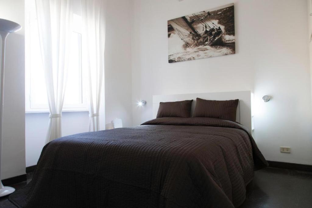 Posteľ alebo postele v izbe v ubytovaní Navona Design Apartment Casa e Appartamento per Vacanze