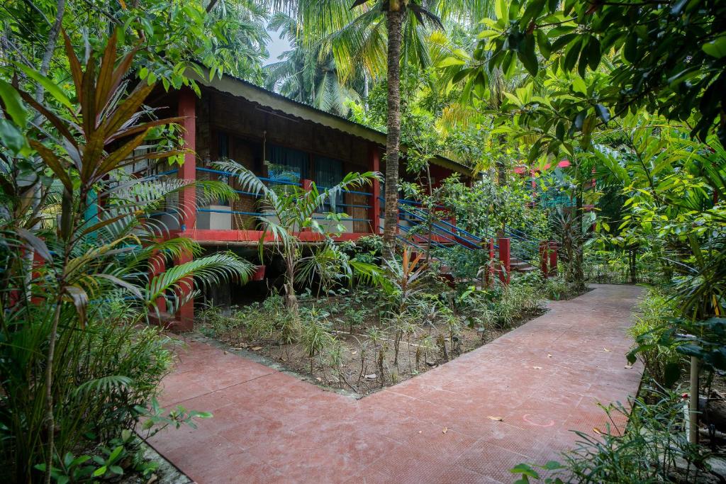 Zahrada ubytování Palm Grove Eco Resort