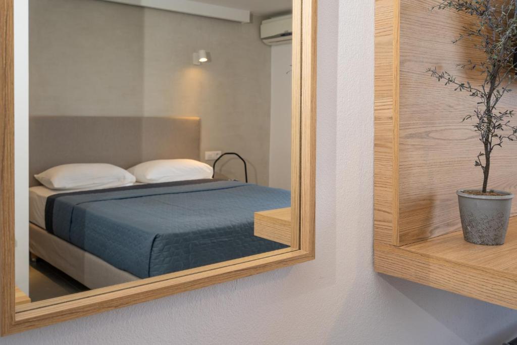 Postel nebo postele na pokoji v ubytování Comfort Zefyros